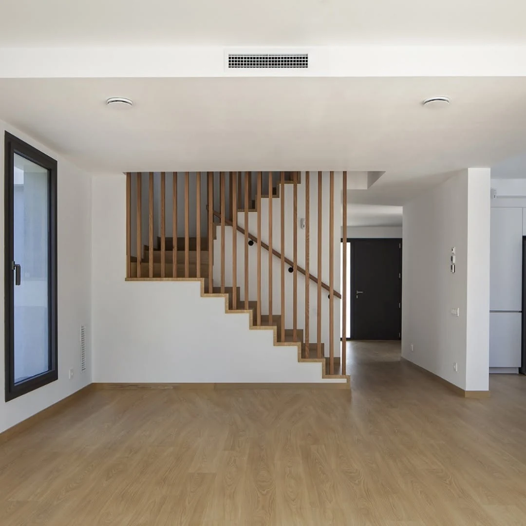 Interior staircase of the completed Begues residence