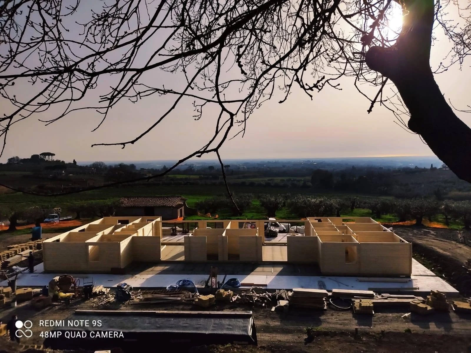 Prepared concrete foundation before timber structure installation
