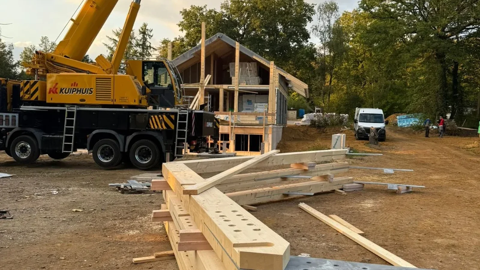 Post and beam structural assembly with crane