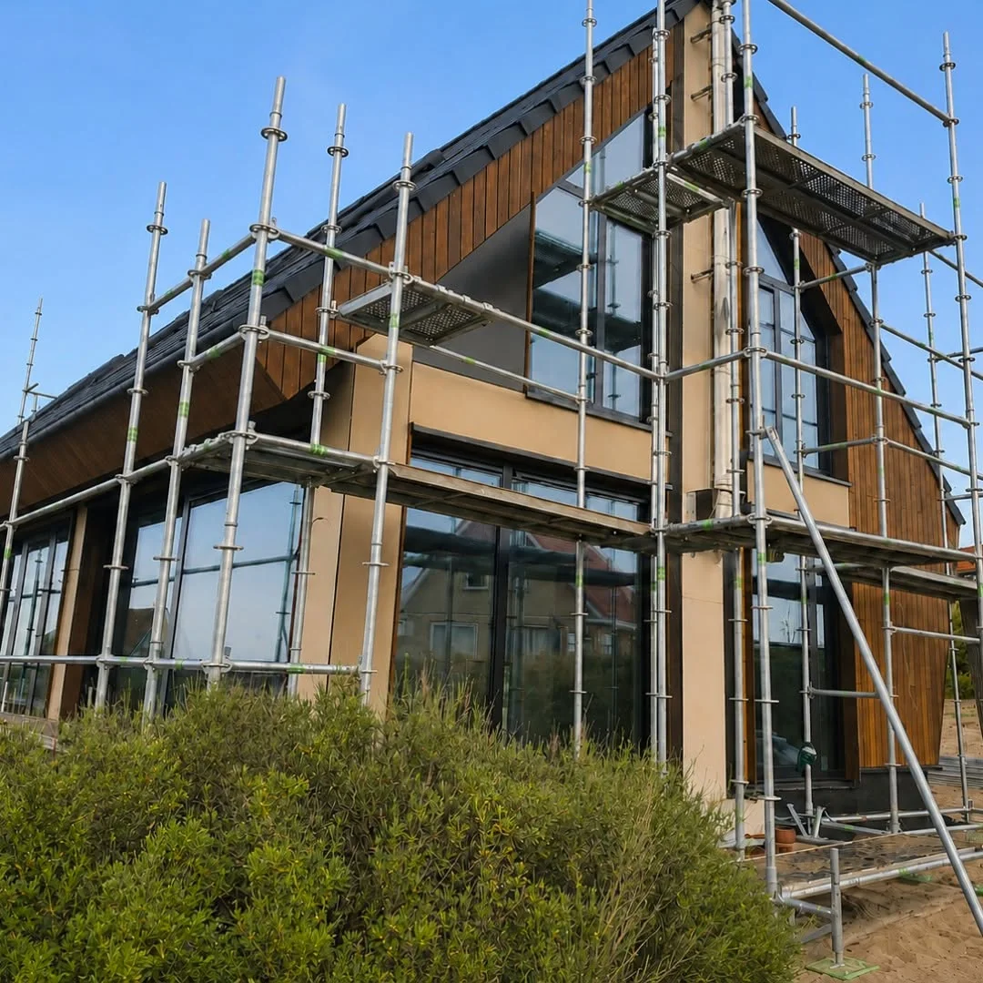 Terschelling angled exterior view with scaffold and glazing